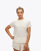 Camiseta de tirantes Hoka para mujer, ideal para el día de la carrera.